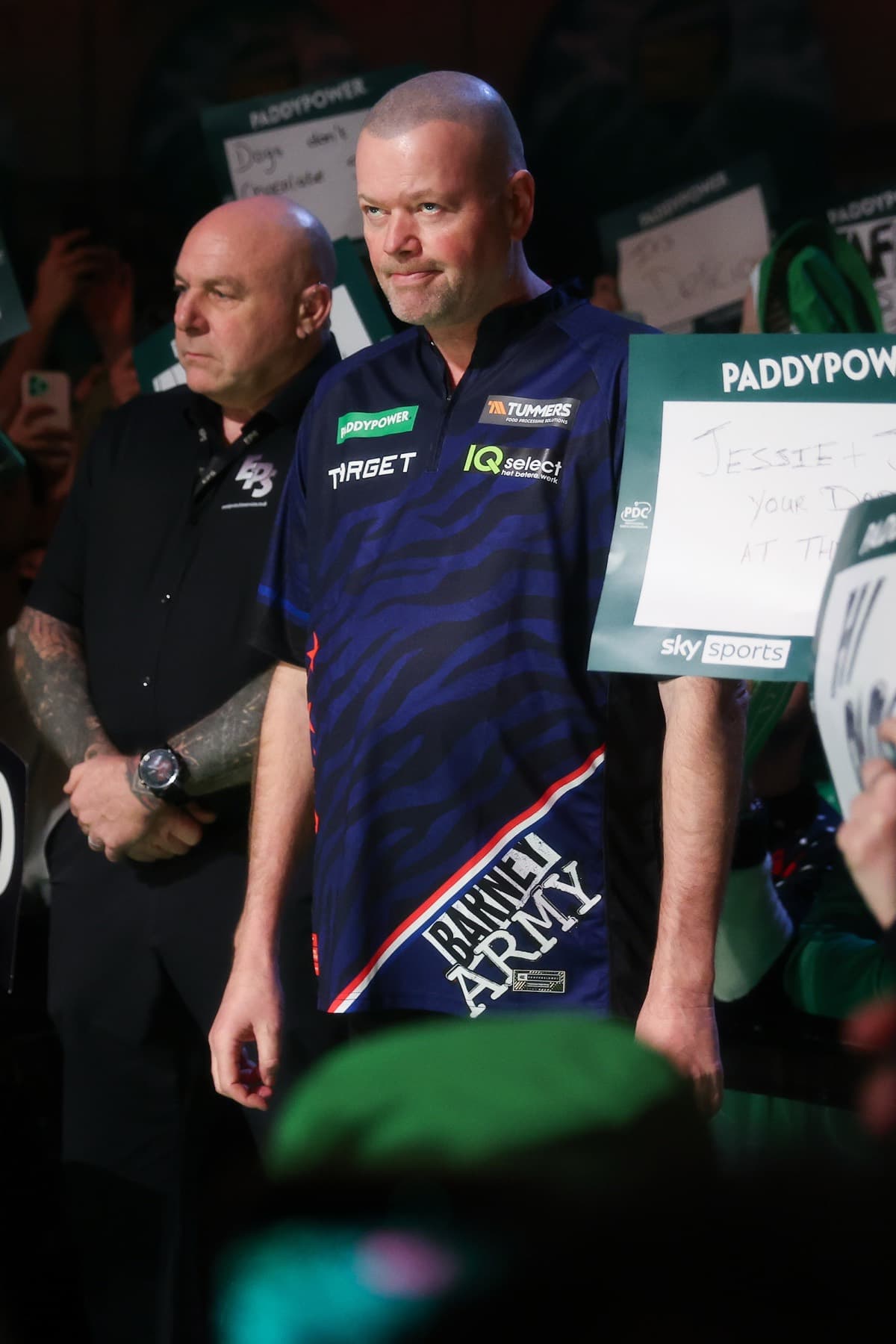 Raymond Van Barneveld walking out to the stage past cheering fans