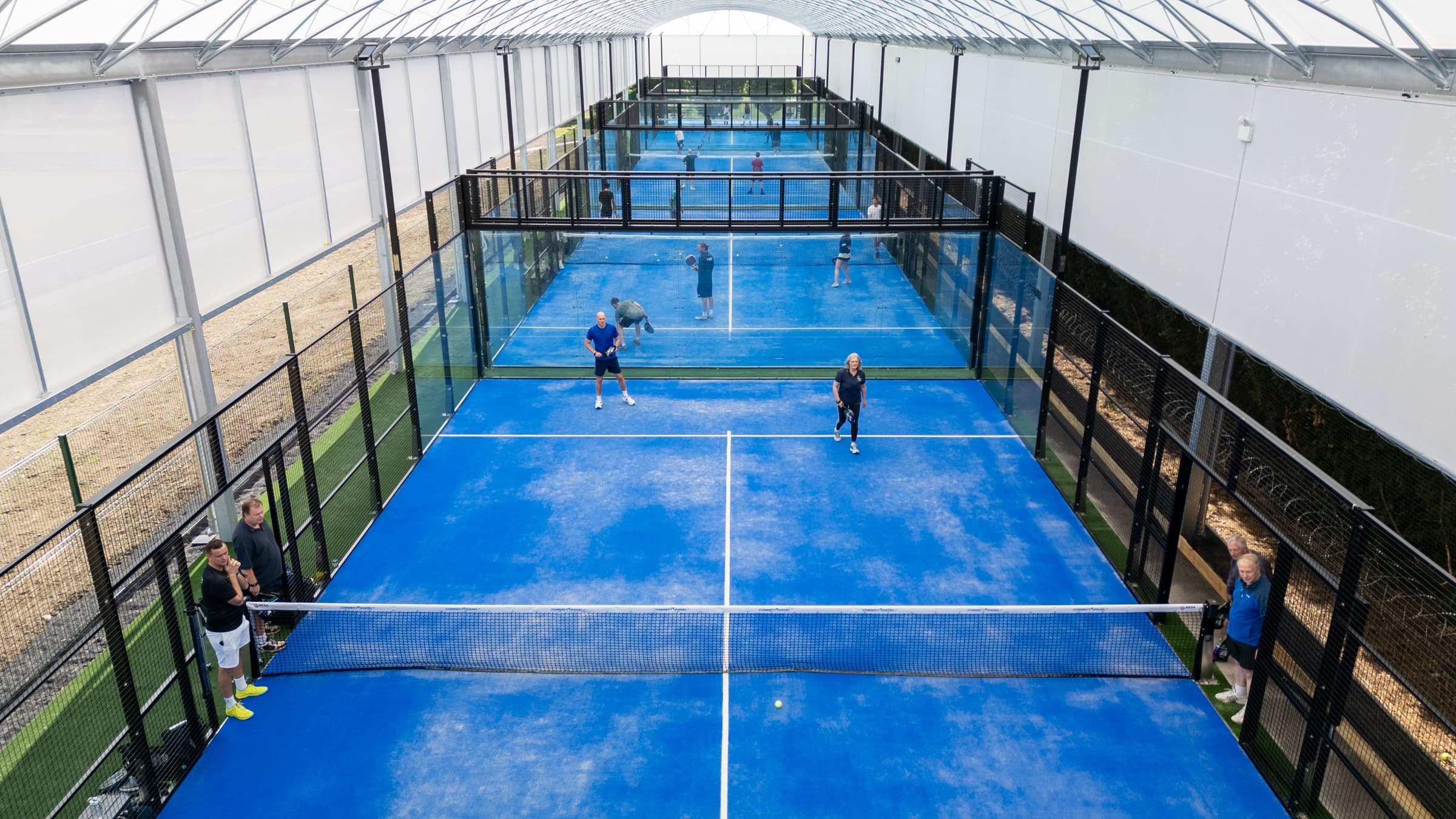 Indoor padel courts under the dome at the sporting village